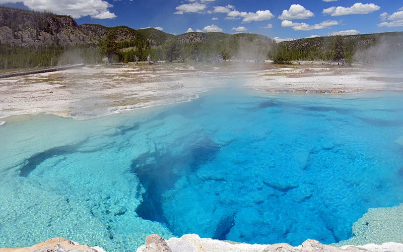 deep blue sapphire hot spring in the biscuit basin